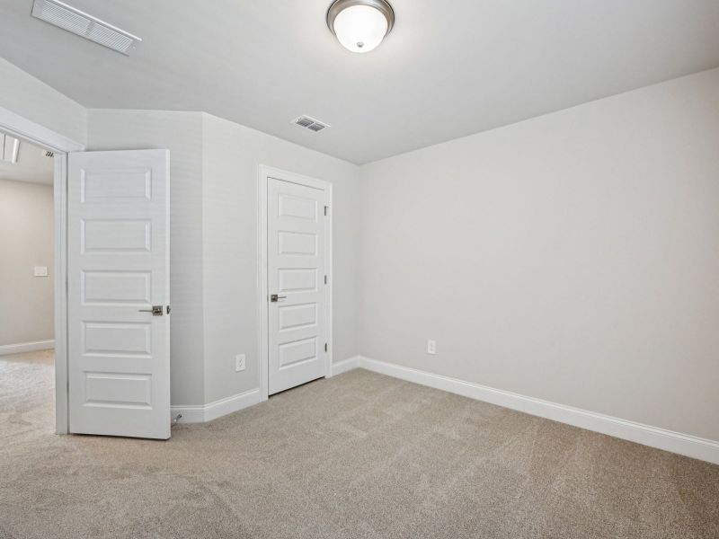 Spacious, unfurnished interior of a new home in Hemingway - Highland Series, Cumming (Image 19).