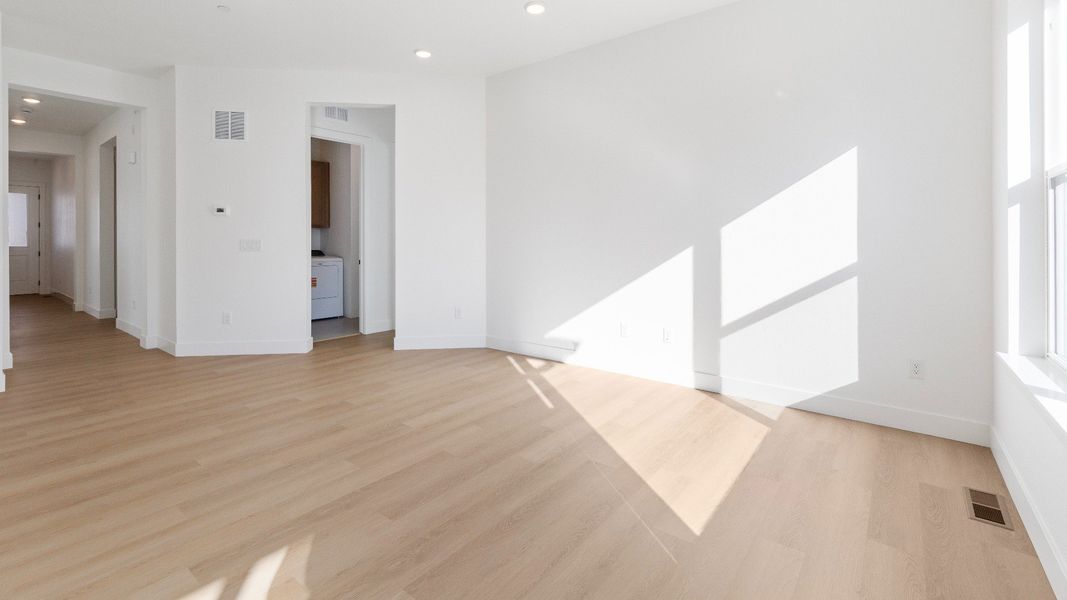 Furnished interior view inside a new home in Dillon Pointe - Journey, Broomfield (Image 13).