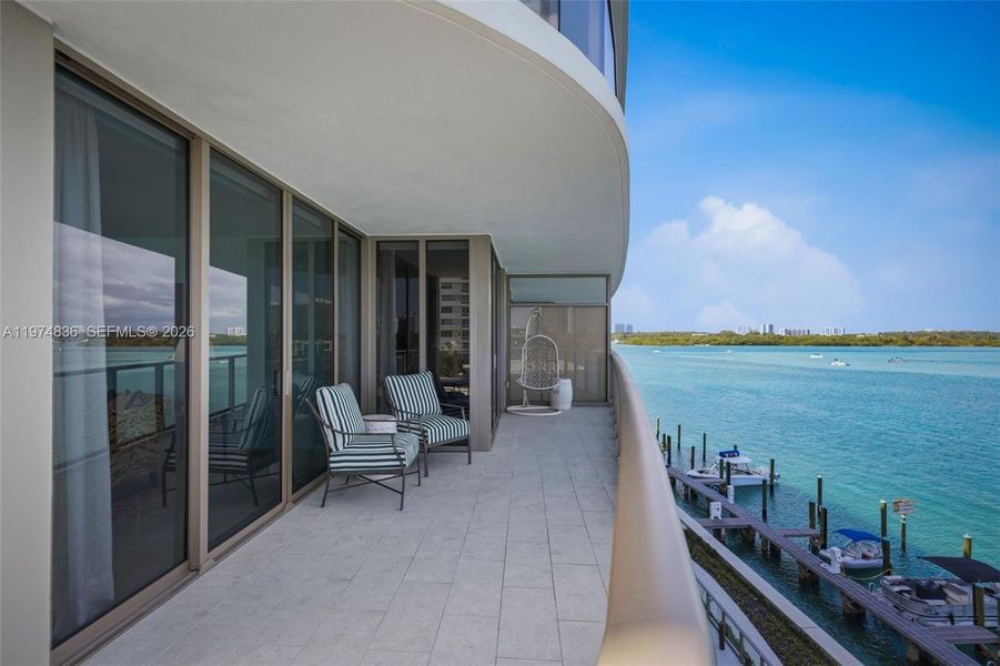 Waterfront terrace with boat slips shown below