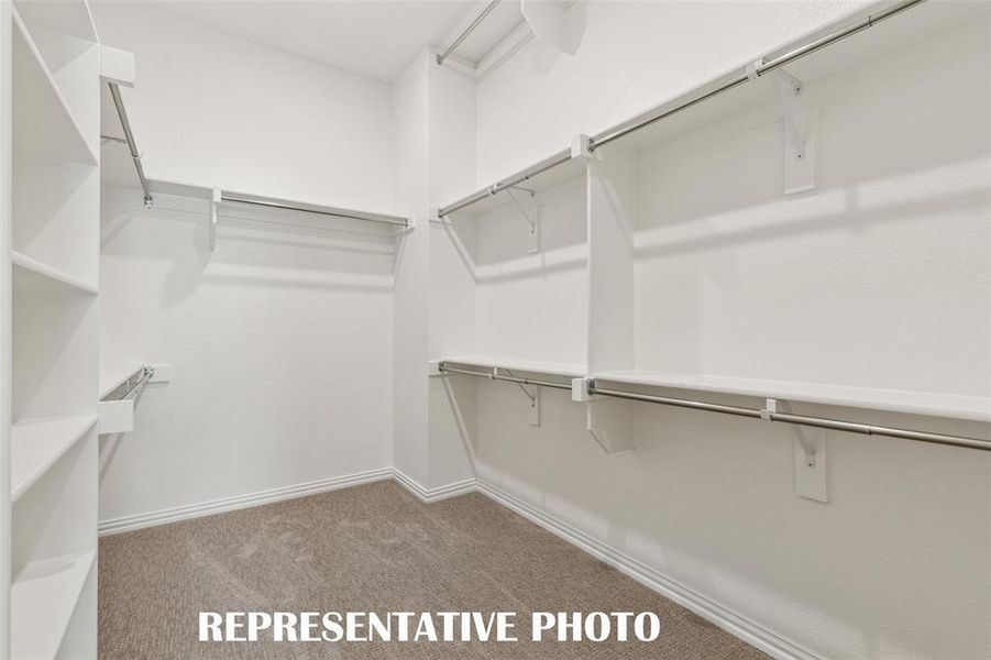 Your new dream owners closet features seasonal hanging racks and plenty of space for two.  REPRESENTATIVE PHOTO