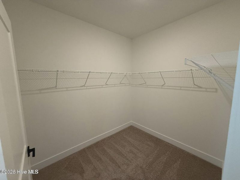 Spacious, unfurnished interior of a new home in Wood Creek Landing, Leland (Image 12).