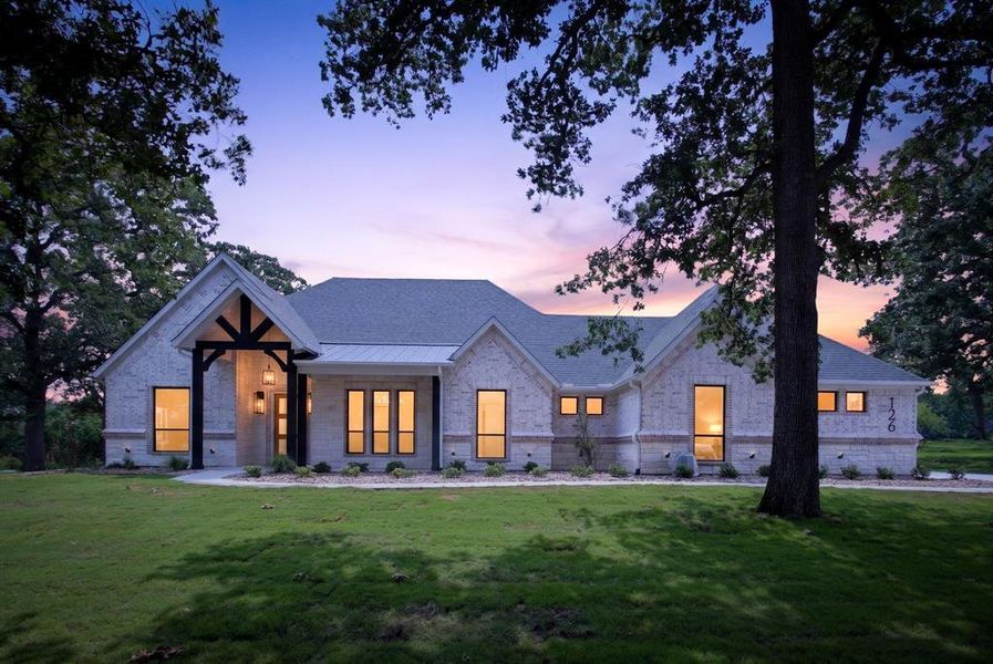 Front exterior of a new home in , Azle, TX, highlighting curb appeal (Image 27). Front exterior of a new home in , Azle, TX, highlighting curb appeal (Image 27).