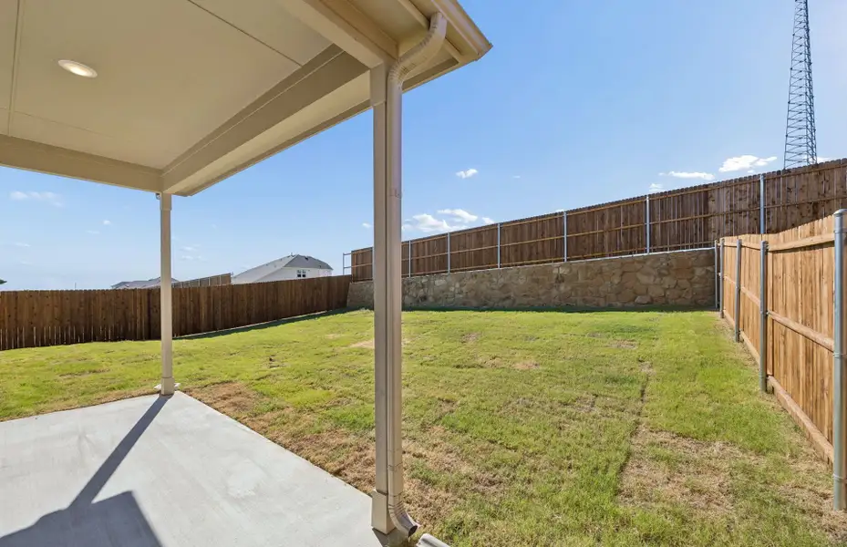 Exterior details and patio area of a home in Rosemary Fields, Godley (Image 3).