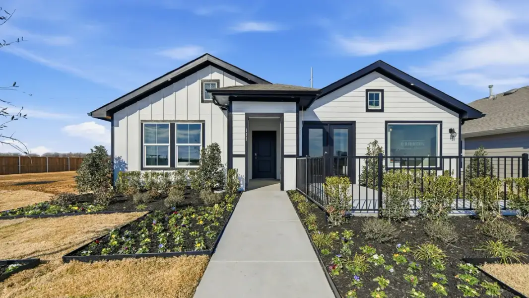 Representative exterior photo of a completed home built from the Texas Cali by D.R. Horton in Hadley Farms, Godley, TX (Image 23).