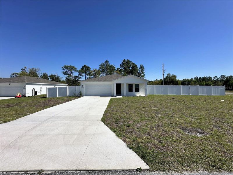 Exterior details and patio area of a home in Marion Oaks, Ocala (Image 29).