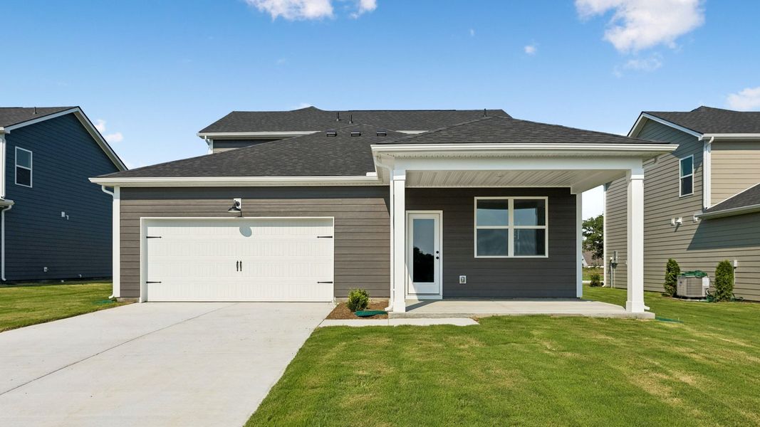 Front exterior of a new home in Reserve at Hickory Ridge, Columbia, TN, highlighting curb appeal (Image 25). Front exterior of a new home in Reserve at Hickory Ridge, Columbia, TN, highlighting curb appeal (Image 25).
