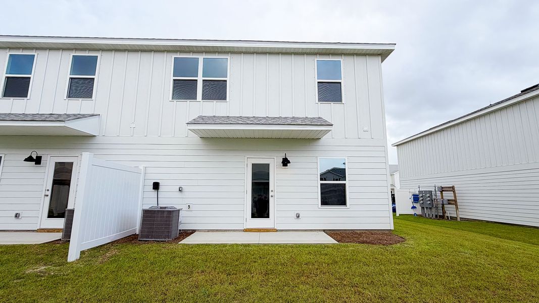 Exterior details and patio area of a home in Salt Creek Townhomes at Mexico Beach, Mexico Beach (Image 3). Exterior details and patio area of a home in Salt Creek Townhomes at Mexico Beach, Mexico Beach (Image 3).