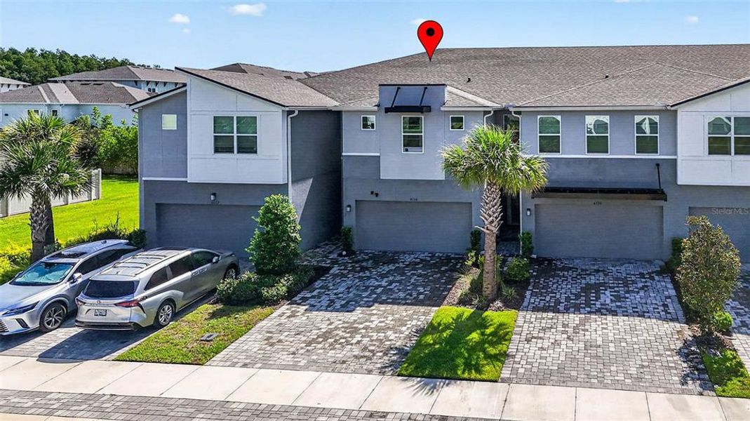 Front exterior of a new home in , Lutz, FL, highlighting curb appeal (Image 30).