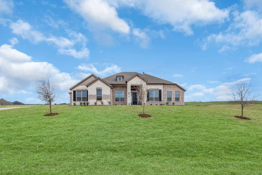 Front exterior of a new home in Berkshire Estates, Mesquite, TX, highlighting curb appeal (Image 23). Front exterior of a new home in Berkshire Estates, Mesquite, TX, highlighting curb appeal (Image 23).
