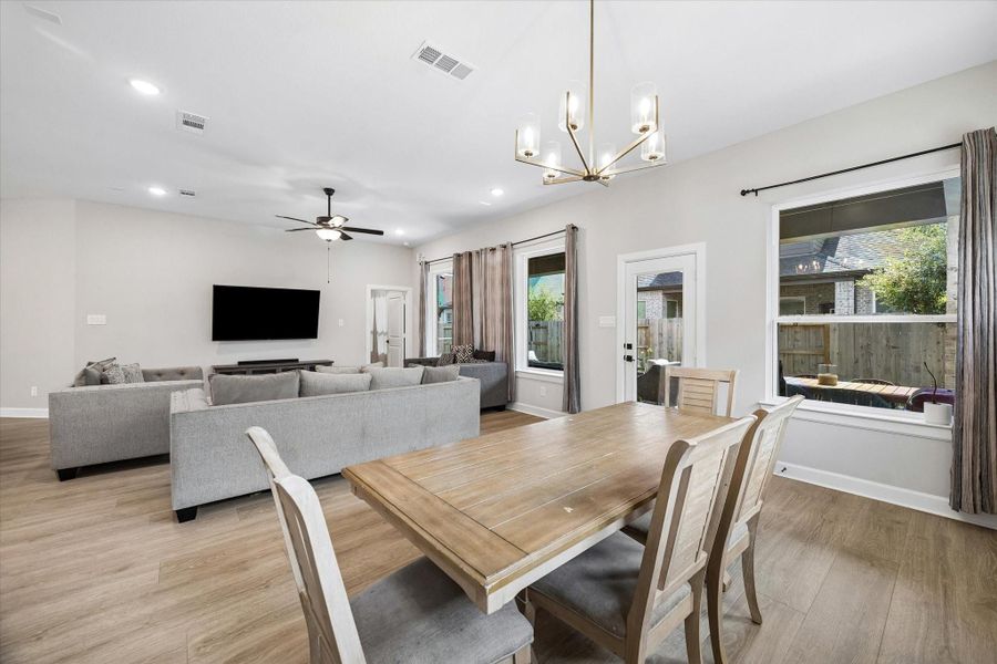 This beautifully designed dining space blends effortlessly with the surrounding living areas, creating an ideal setting for entertaining family and friends. This beautifully designed dining space blends effortlessly with the surrounding living areas, creating an ideal setting for entertaining family and friends.