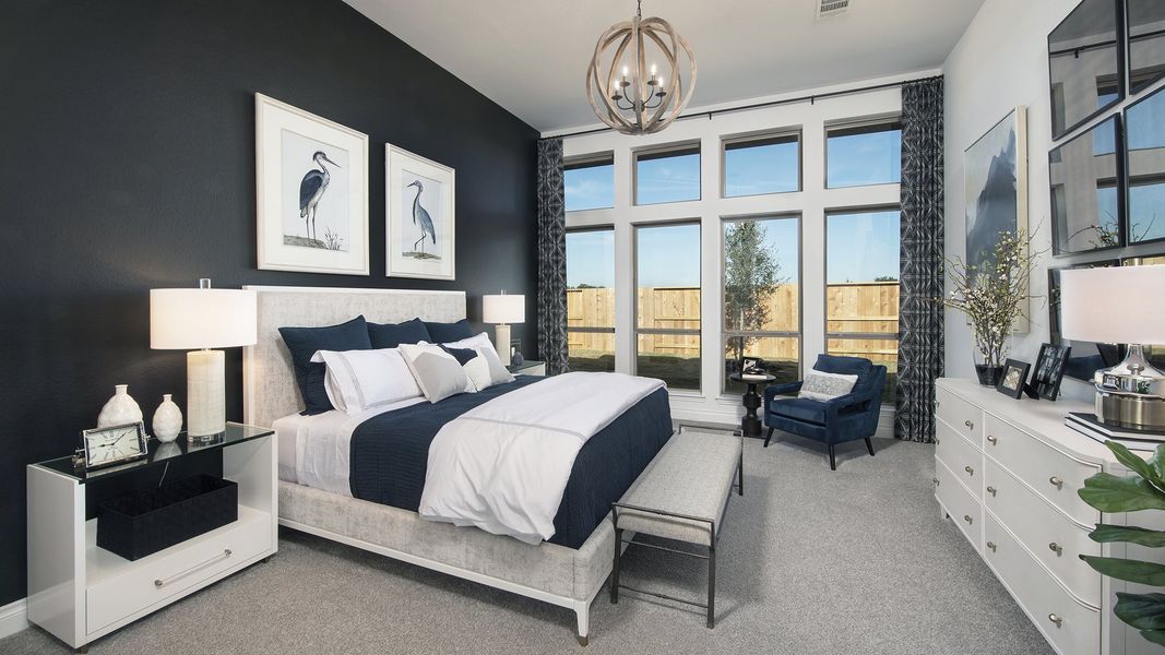 Representative furnished interior of a home built from the 3578W by Perry Homes in Lakes of Cane Island, Katy (Image 34).