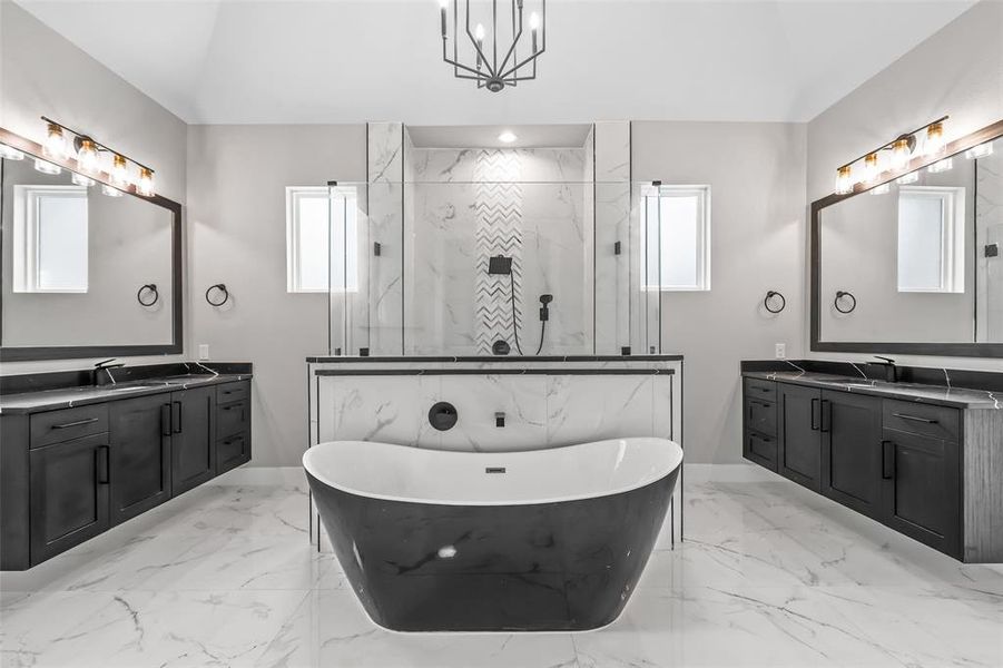 Bathroom with dual bowl vanity, tile patterned flooring, and separate shower and tub