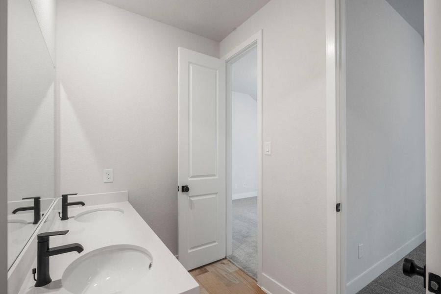 Furnished interior view inside a new home in The Woodlands Hills, Willis (Image 13).