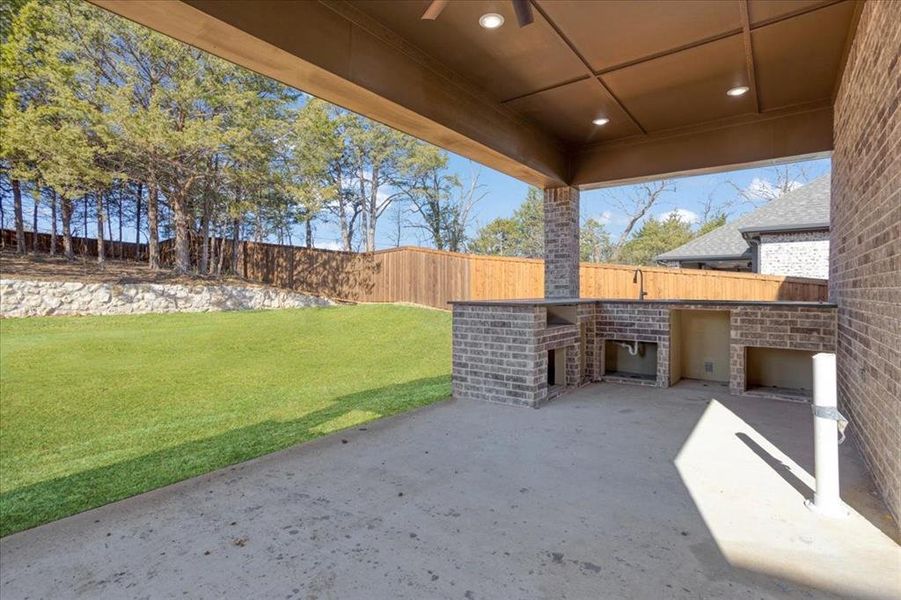 Exterior details and patio area of a home in , Denison (Image 24).