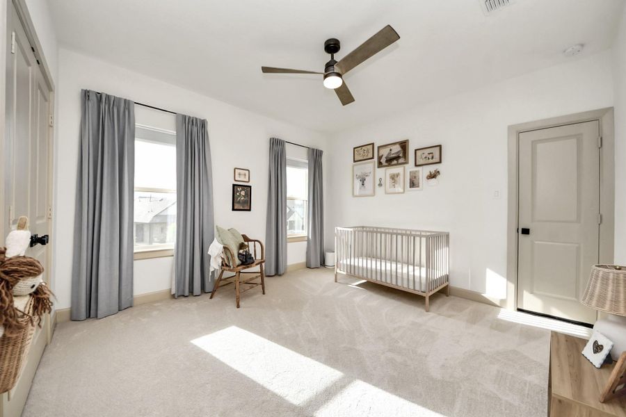 Upstairs bedroom offering a comfortable layout and versatility for different needs.