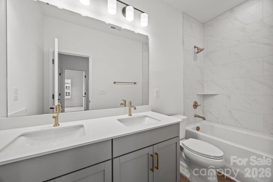 Furnished interior view inside a new home in The River District Townhomes, Charlotte (Image 8).