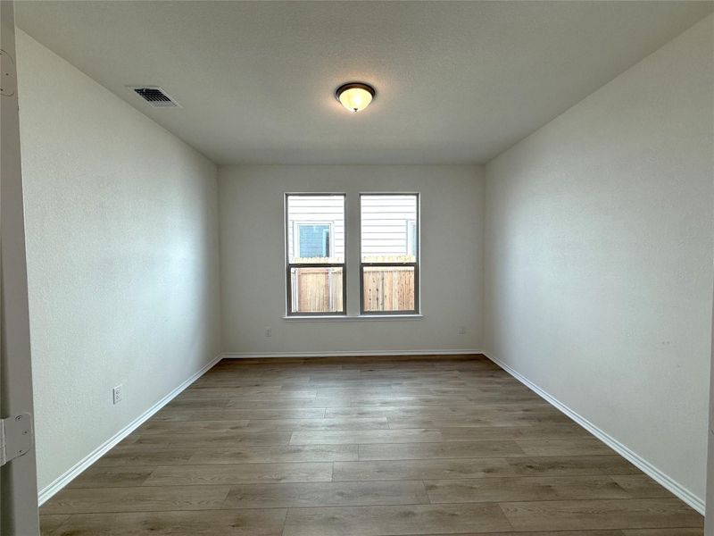 Spacious, unfurnished interior of a new home in River Bluff, Leander (Image 26).