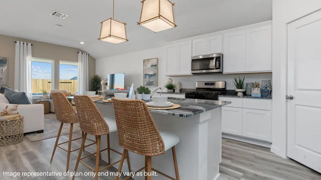 Furnished interior view inside a new home in Caldwell Crossing, Iowa Colony (Image 8).