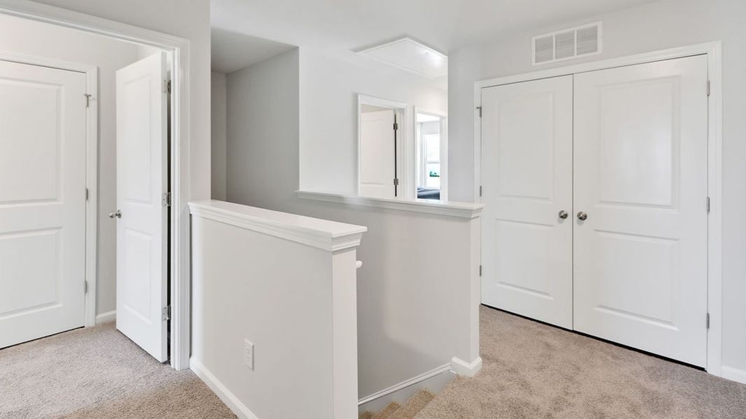 Representative furnished interior of a home built from the MITCHELL TOWNHOME by D.R. Horton in Grayson Park Townhomes, Leland (Image 15). Representative furnished interior of a home built from the MITCHELL TOWNHOME by D.R. Horton in Grayson Park Townhomes, Leland (Image 15).