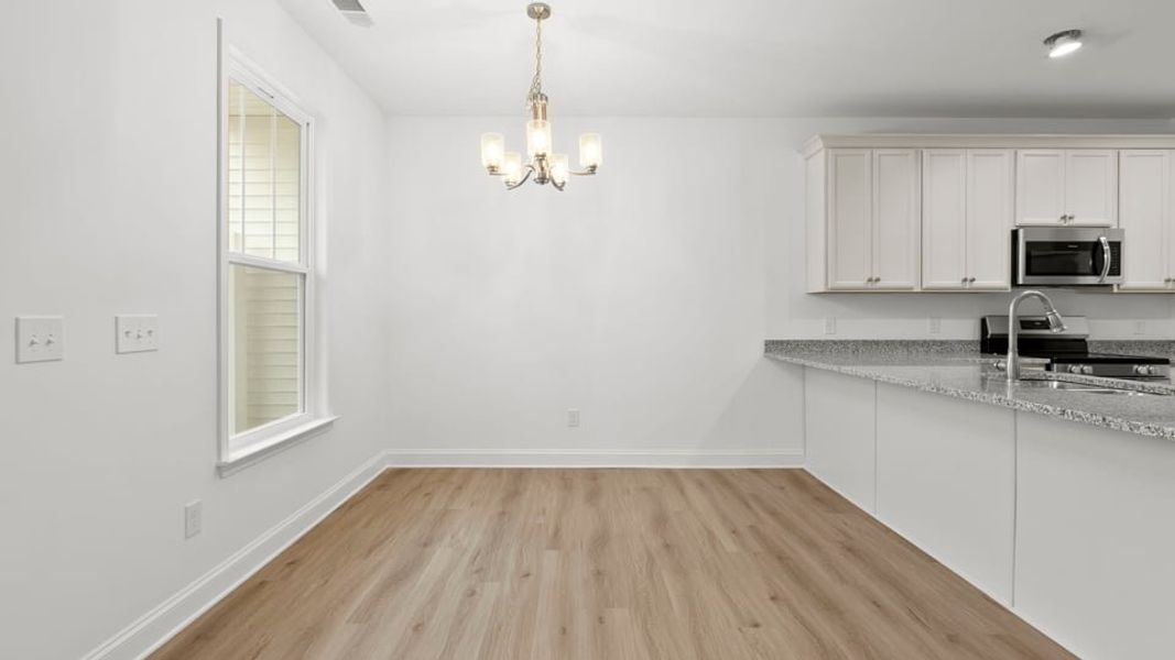 Representative unfurnished interior of a home built from the Interior Unit by D.R. Horton in Pearson Road Townhomes, Easley (Image 21).
