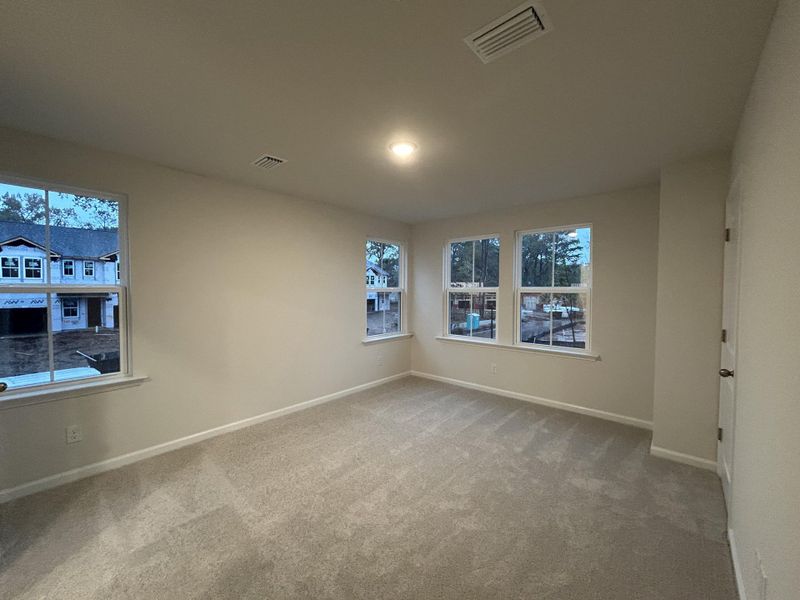 Spacious, unfurnished interior of a new home in Windward Village, Summerville (Image 17).