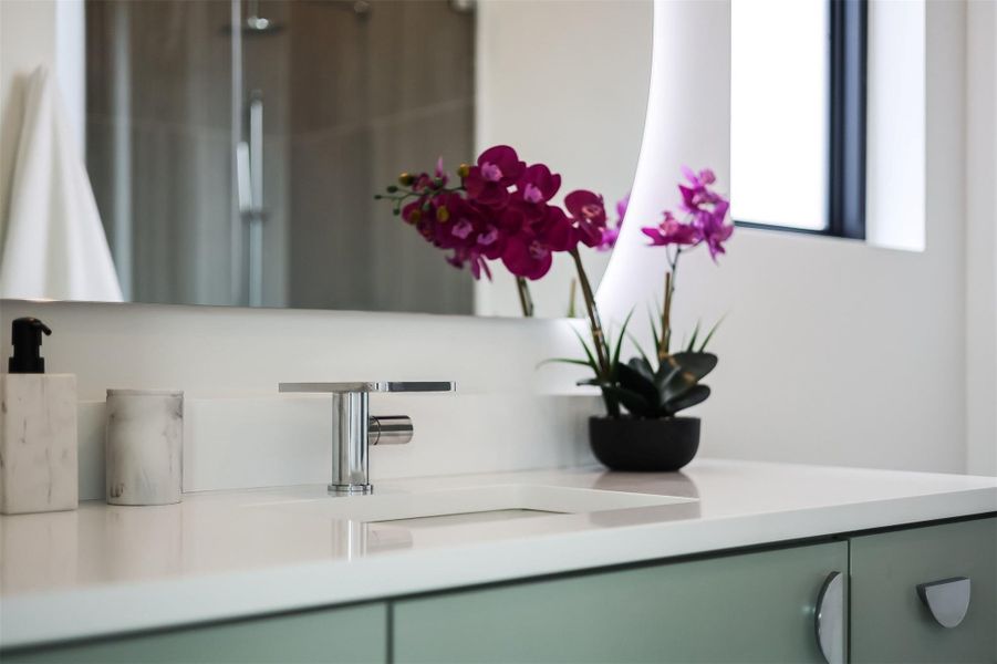 No "standard" finishes here—only designer hardware and solid-core doors that feel substantial every time they close