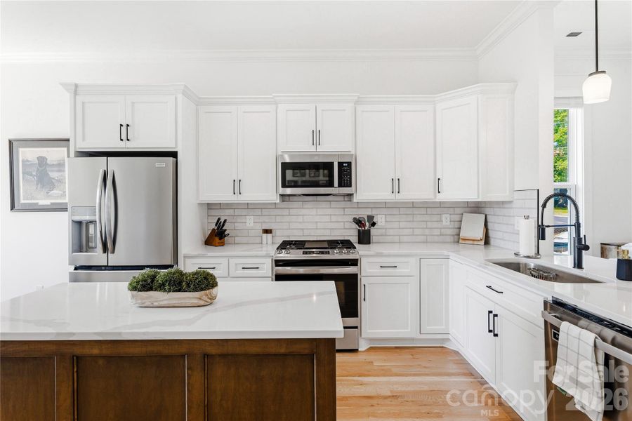 Furnished interior view inside a new home in , Belmont (Image 9).