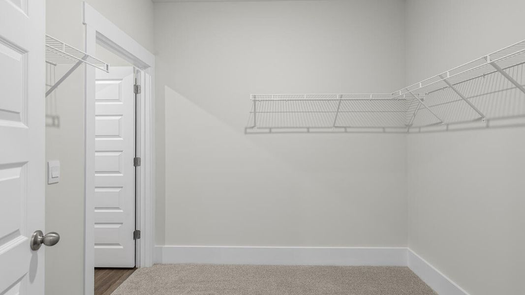 Spacious, unfurnished interior of a new home in The Haven at Indigo Preserve, Leland (Image 25).