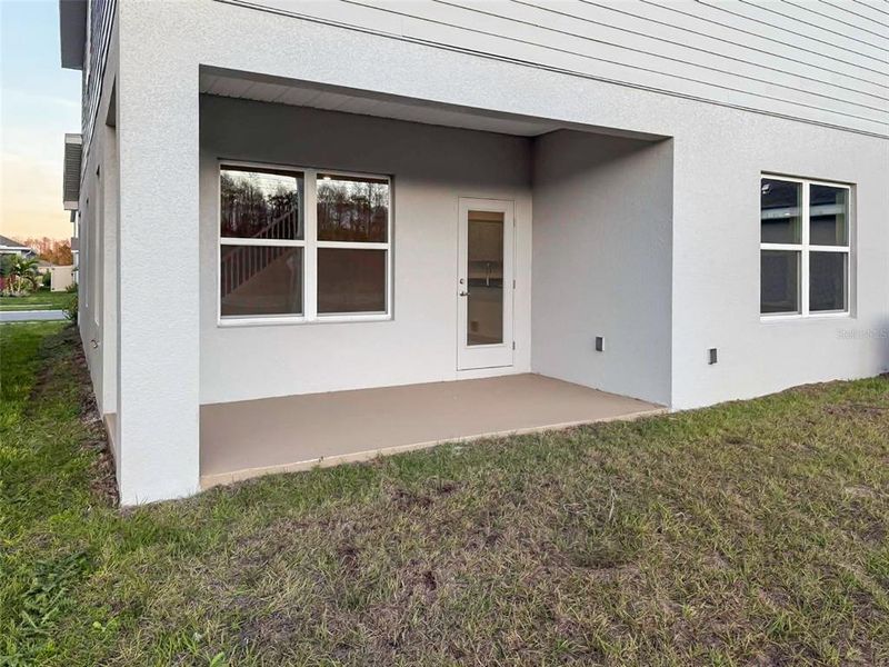 Exterior details and patio area of a home in Harmony Central, St. Cloud (Image 3).