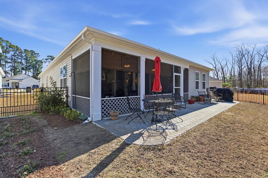 Exterior details and patio area of a home in , Murrells Inlet (Image 3).