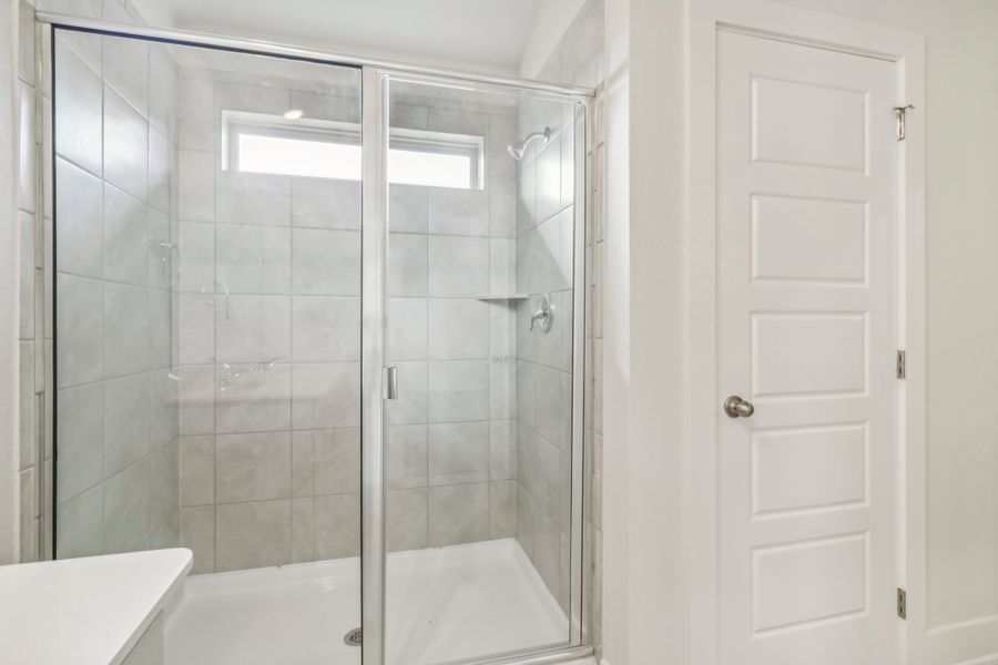 Primary suite bathroom in the Hughes floorplan at a Meritage Homes community.