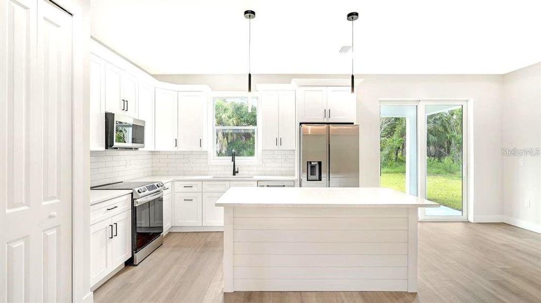 Furnished interior view inside a new home in , Port Charlotte (Image 5).