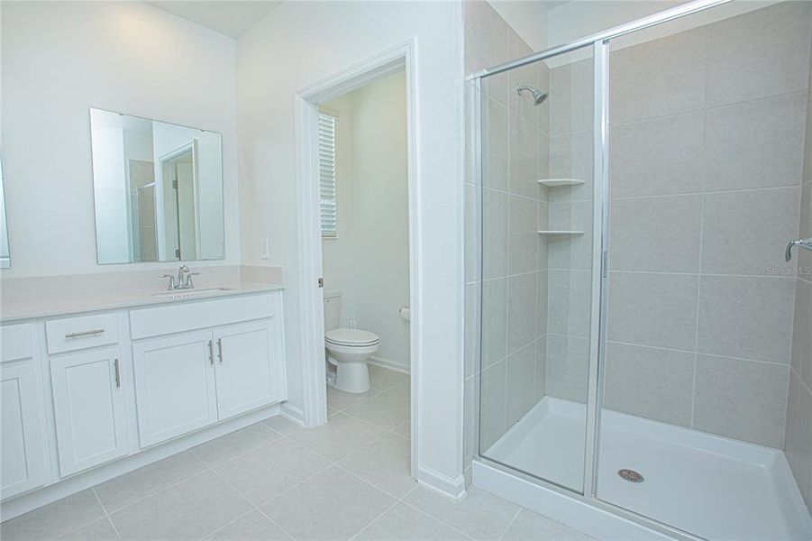 Furnished interior view inside a new home in Tohoqua, Kissimmee (Image 12).