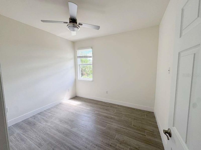 Spacious, unfurnished interior of a new home in , Port Charlotte (Image 11).