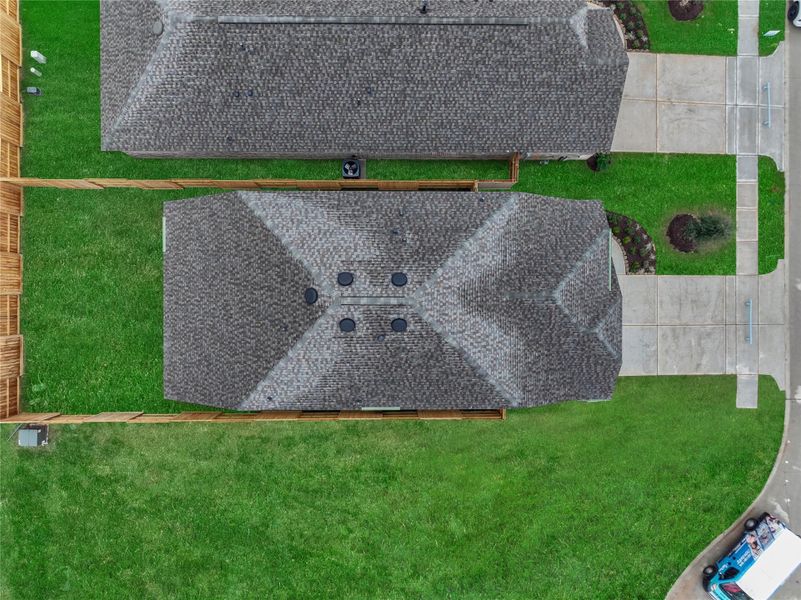 Exterior details and patio area of a home in Oakberry Trails, Waller (Image 4).