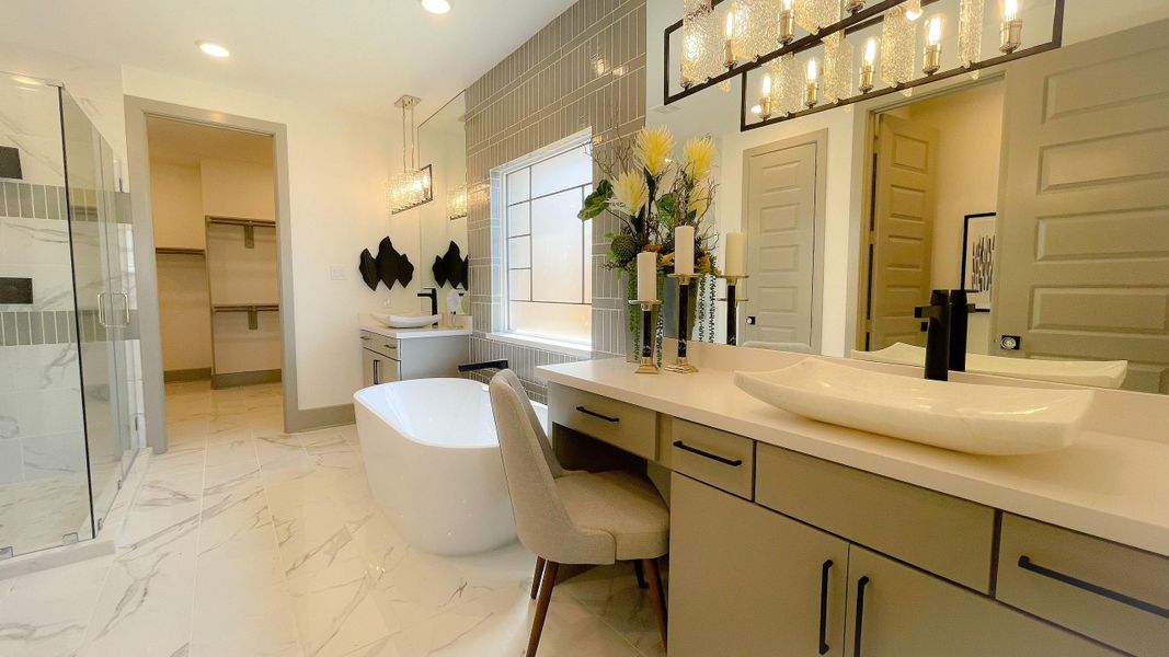 Furnished interior view inside a new home in Sunterra, Katy (Image 22).