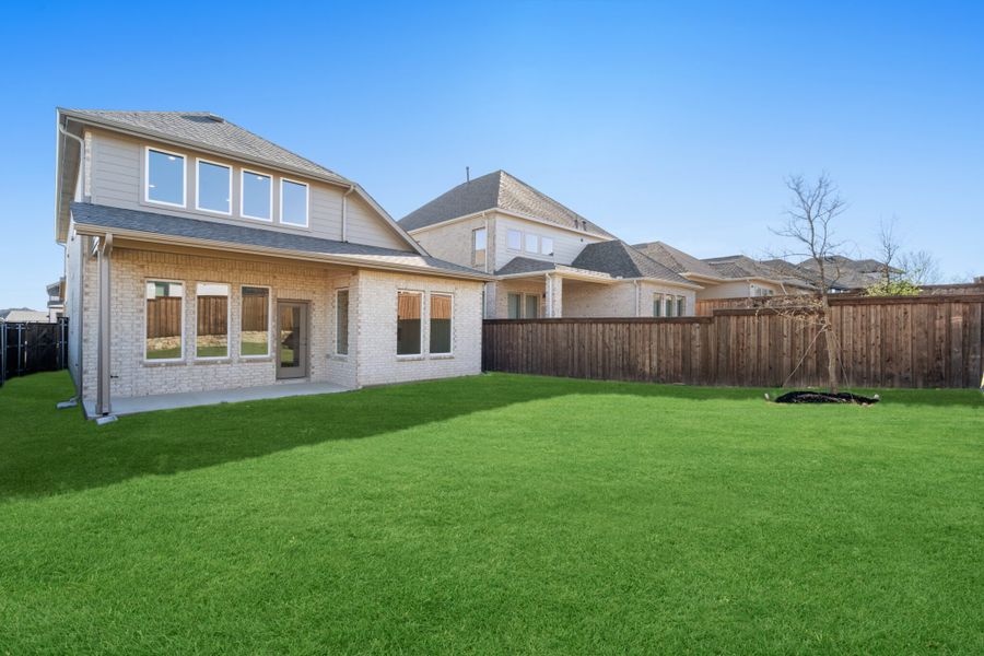 Exterior details and patio area of a home in Reunion, Rhome (Image 24).
