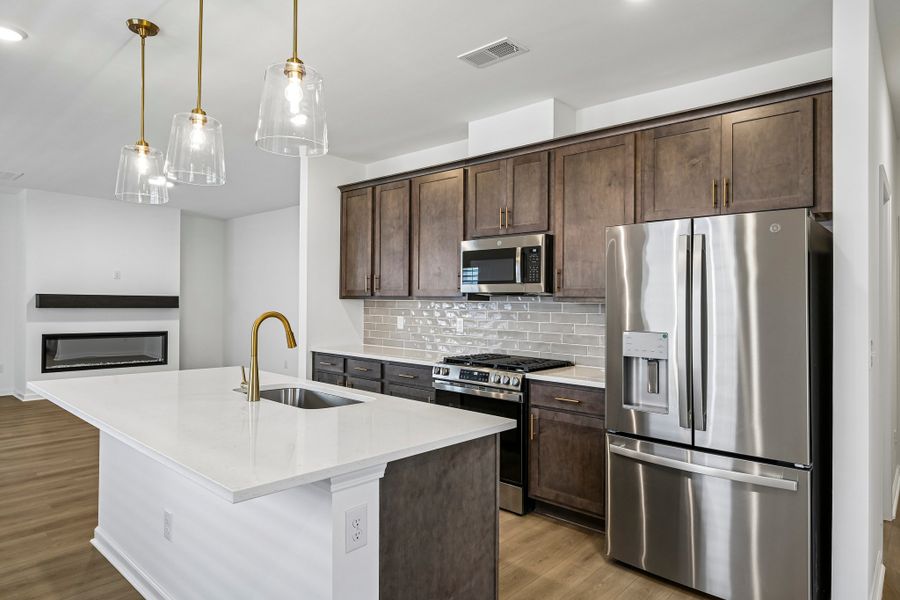 Representative furnished interior of a home built from the Emma II by Ashton Woods in The Point, Rolesville (Image 8).