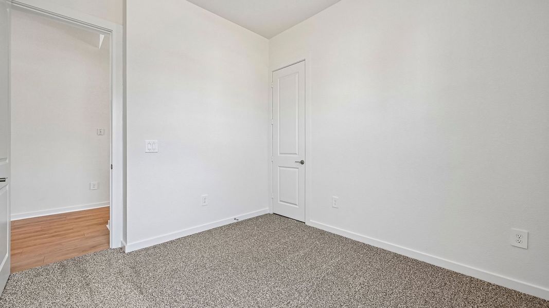 Spacious, unfurnished interior of a new home in The Enclave at Bar W Ranch, Leander (Image 34).