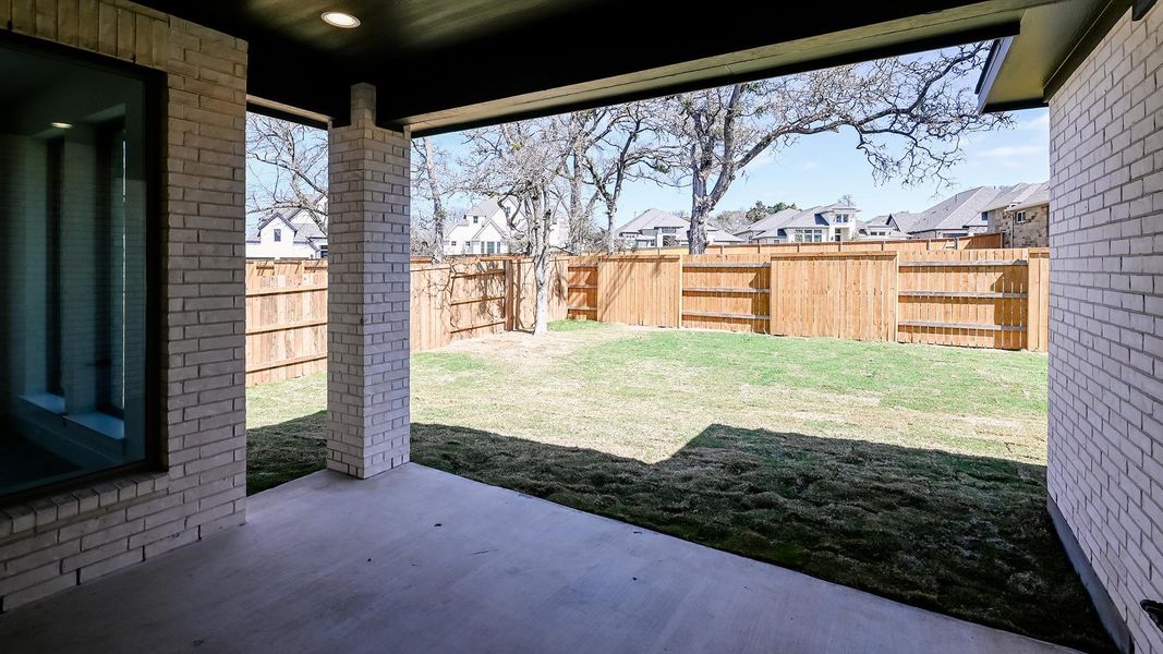 Exterior details and patio area of a home in 6 Creeks, Kyle (Image 3).