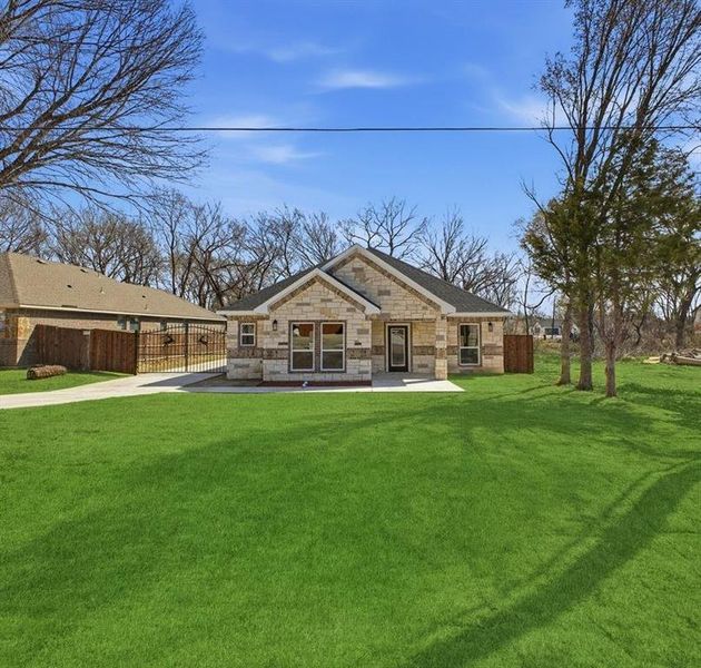 Front exterior of a new home in , Glenn Heights, TX, highlighting curb appeal (Image 2). Front exterior of a new home in , Glenn Heights, TX, highlighting curb appeal (Image 2).