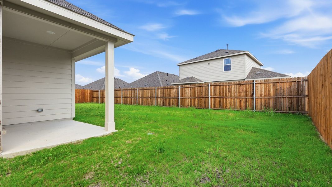 Exterior details and patio area of a home in Patriot Estates, Venus (Image 4).