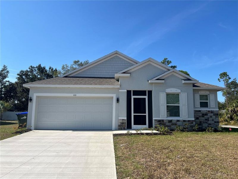 Front exterior of a new home in , North Port, FL, highlighting curb appeal (Image 2).