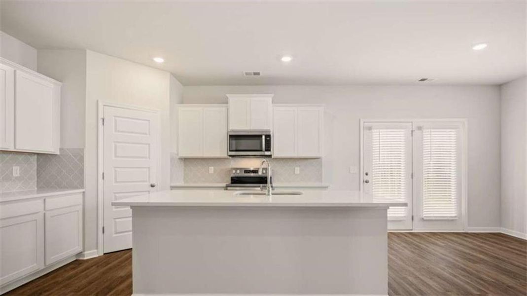 Furnished interior view inside a new home in Oakchase at Hampton, Hampton (Image 3). Furnished interior view inside a new home in Oakchase at Hampton, Hampton (Image 3).