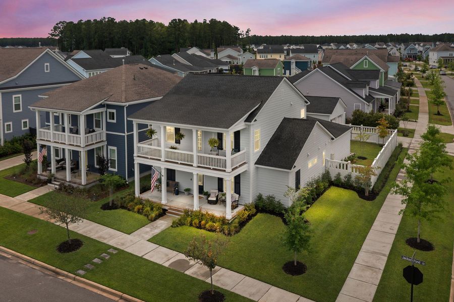 Front exterior of a new home in Nexton - Midtown - The Village Collection, Summerville, SC, highlighting curb appeal (Image 26).