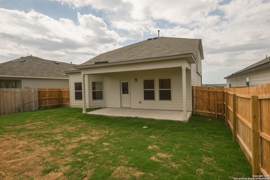 Front exterior of a new home in Hunters Ranch, San Antonio, TX, highlighting curb appeal (Image 21).