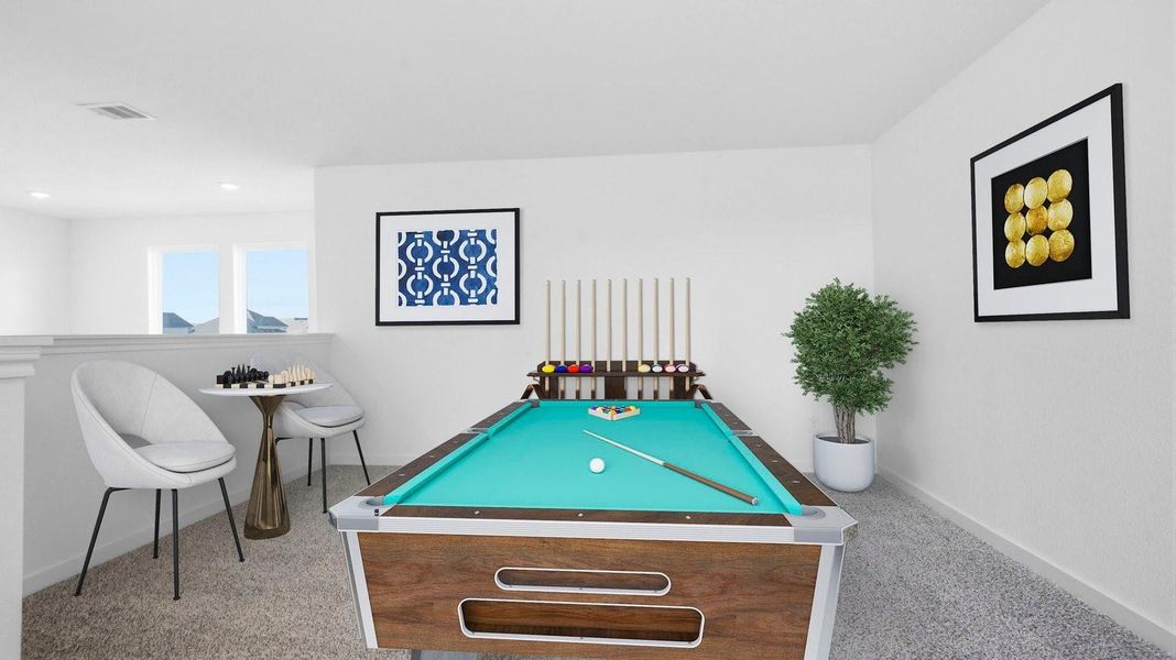A spacious upstairs living area with plenty of natural light from windows overlooking side of the home A spacious upstairs living area with plenty of natural light from windows overlooking side of the home