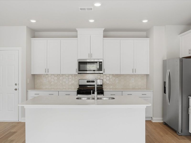 Furnished interior view inside a new home in Brayfield Manor - Heritage Collection, Wellford (Image 4).