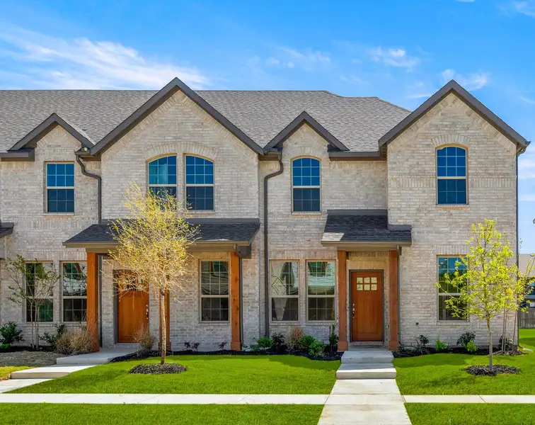 Representative exterior photo of a completed home built from the Graham by Impression Homes in Sanger Circle – Townhomes, Sanger, TX (Image 1). Representative exterior photo of a completed home built from the Graham by Impression Homes in Sanger Circle – Townhomes, Sanger, TX (Image 1).