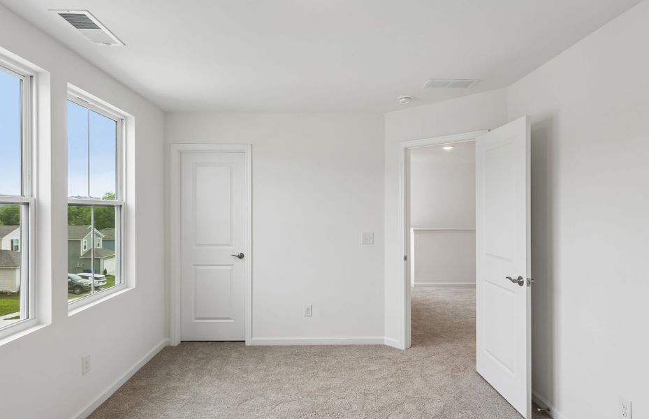 Spacious, unfurnished interior of a new home in Highlands of Carter's Station, Columbia (Image 15). Spacious, unfurnished interior of a new home in Highlands of Carter's Station, Columbia (Image 15).